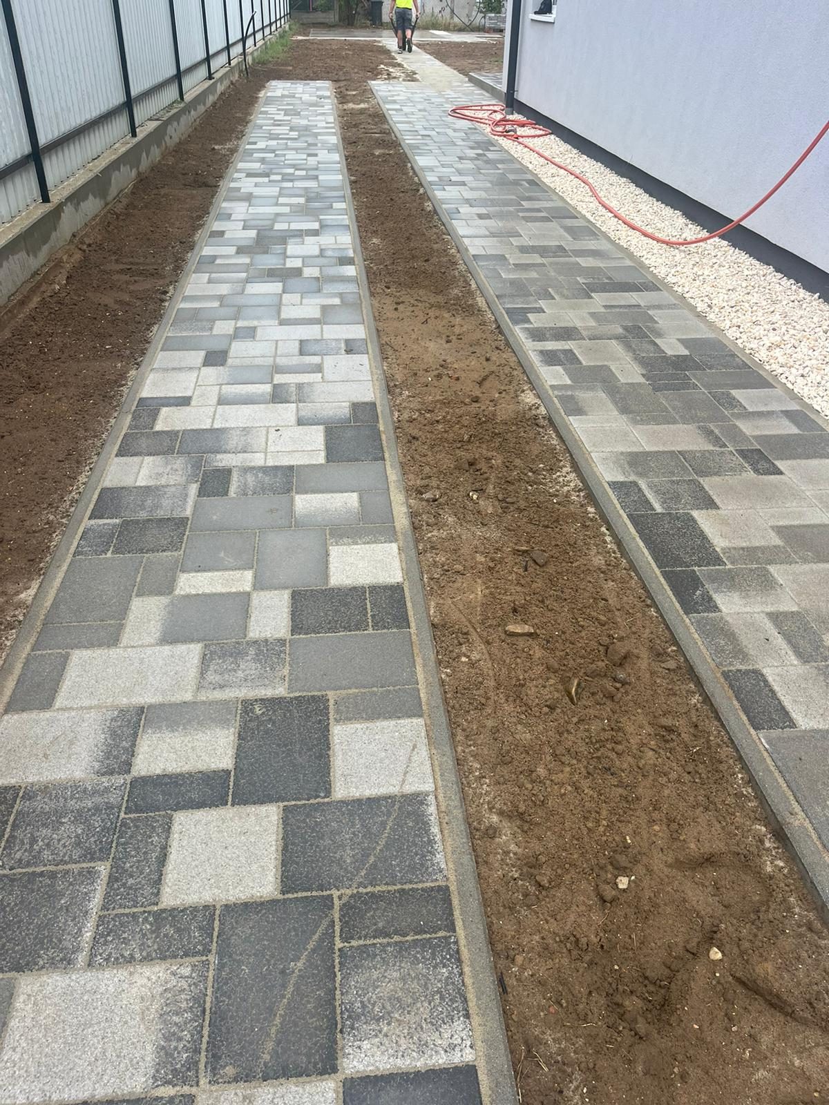 Stepped hollow-block planter wall – sloping garden