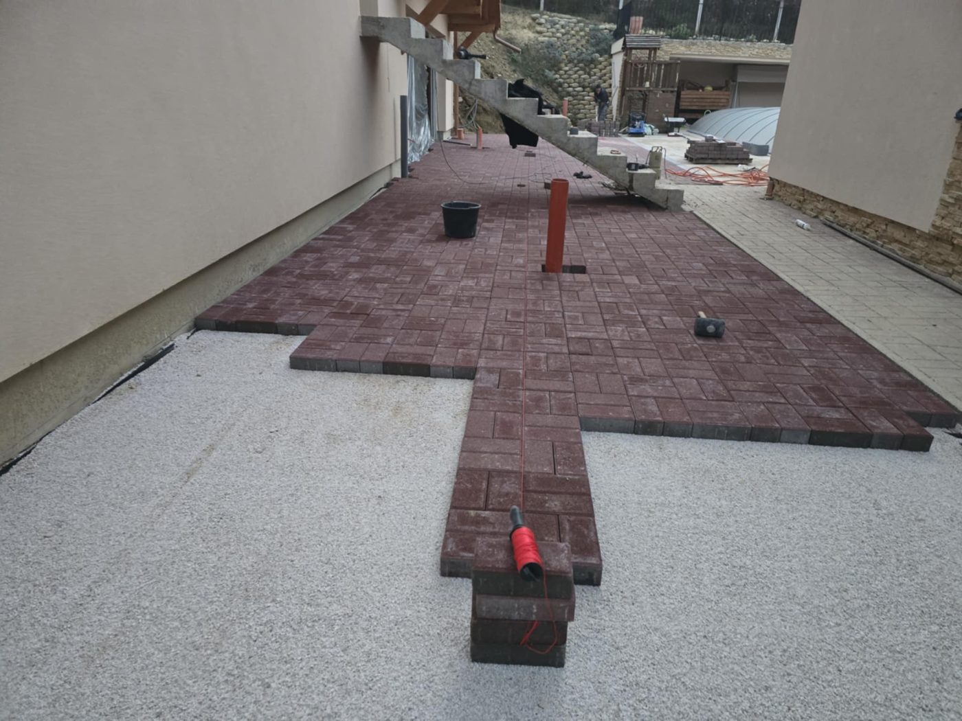 Garden retaining wall built from concrete planter blocks
